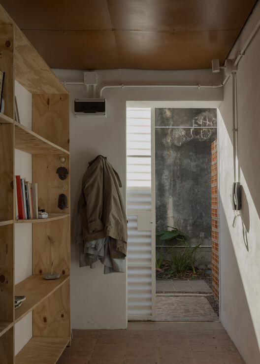 Conjunto Habitacional 954 / Este Norte Estudio - Fotografia de Interiores, Armário, Madeira