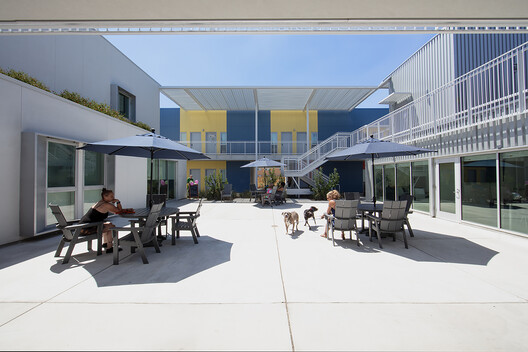 Northview Point Apartments / Brooks Scarpa Huber - Facade, Balcony, Courtyard