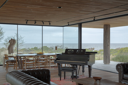 Music Room - Casa La Flecha / González Olsina & Vega Arquitectos Music Room - Casa La Flecha / González Olsina & Vega Arquitectos - Interior Photography, Dining room, Wood, Table, Chair, Deck