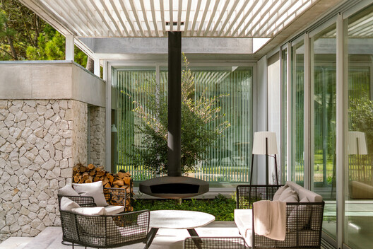 House by the Sea / Jorgelina Tortorici & Asociados House by the Sea / Jorgelina Tortorici & Asociados - Interior Photography, Living Room, Garden, Patio, Chair, Courtyard