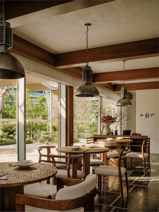 Sanya CR Land Haitang Bay Waterfront Center / Vari Architects - Interior Photography, Dining room, Table, Wood, Chair, Lighting, Glass