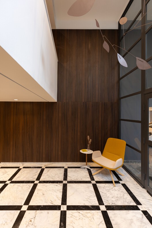 Escritório Gondim Albuquerque Negreiros ADV / StudioVA Arquitetos - Fotografia de Interiores, Madeira, Iluminação, Cadeira