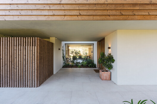 Casa en Quinta do Perú / GSS arquitectos - Fotografía interior, Madera, Patio interior