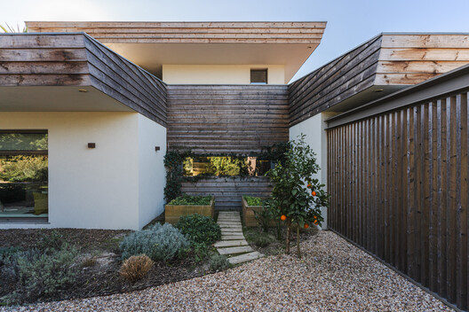 Casa en Quinta do Perú / GSS arquitectos - Fotografía exterior, Jardín