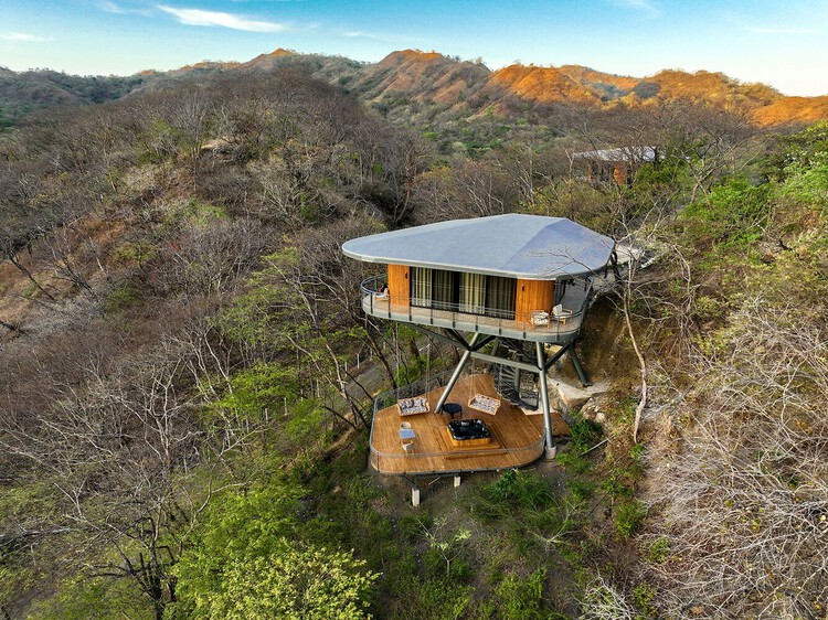 Building with the Landscape: Non-Invasive Design Strategies for Steep Terrain - Featured Image