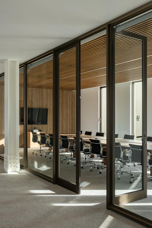 New PRF Headquarters Building / Impare Arquitectura New PRF Headquarters Building / Impare Arquitectura - Interior Photography, Wood, Chair, Table, Glass