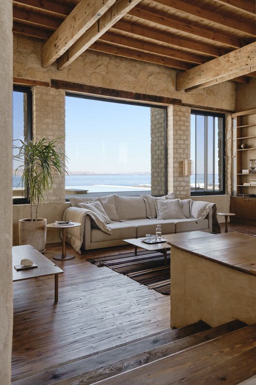 Gagy Self-Sufficient House / Kareem Aldomiaty + Ehab Aldomiaty Gagy Self-Sufficient House / Kareem Aldomiaty + Ehab Aldomiaty - Interior Photography, Wood, Table, Chair