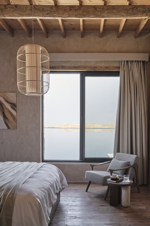 Gagy Self-Sufficient House / Kareem Aldomiaty + Ehab Aldomiaty Gagy Self-Sufficient House / Kareem Aldomiaty + Ehab Aldomiaty - Interior Photography, Bedroom, Wood, Lighting, Bed