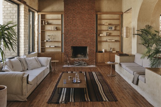 Gagy Self-Sufficient House / Kareem Aldomiaty + Ehab Aldomiaty Gagy Self-Sufficient House / Kareem Aldomiaty + Ehab Aldomiaty - Interior Photography, Wood, Sofa, Lighting, Table, Brick, Chair