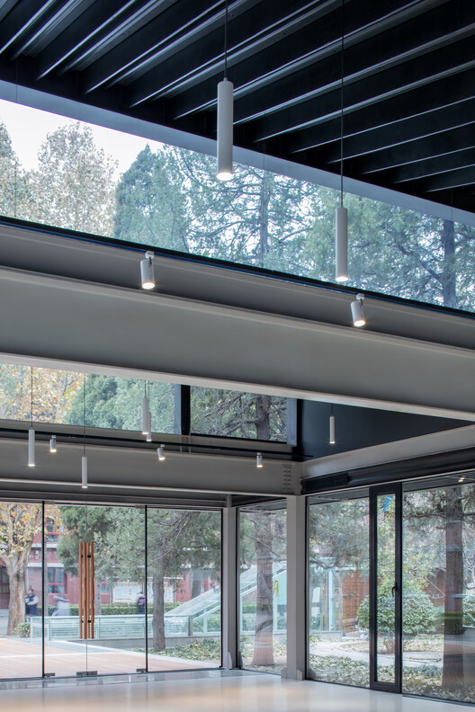 Beijing National Day School Student Creative Activity Center / Origin Architect - Exterior Photography, Lighting, Glass, Beam, Column