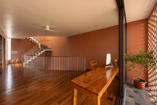 Creative Usage of Bricks & Earth / H&P Architects Creative Usage of Bricks & Earth / H&P Architects - Interior Photography, Wood, Stairs, Handrail, Chair