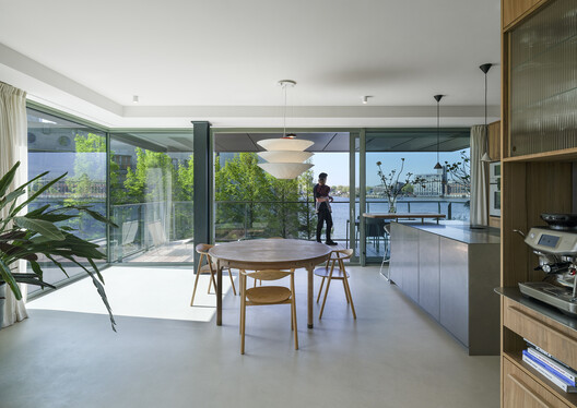 KAAP - Residential District and Circular Pavilion / Powerhouse Company + Orange Architects + NEXT architects KAAP - Residential District and Circular Pavilion / Powerhouse Company + Orange Architects + NEXT architects - Interior Photography, Glass, Chair
