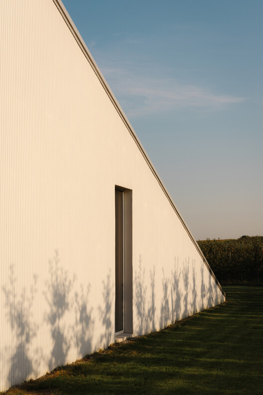 Slope House / SOURCE Architecture Studio - Image 19 of 27