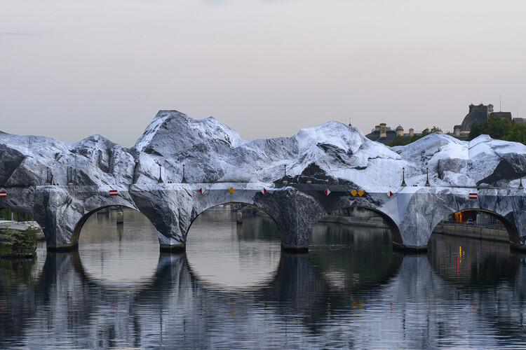 Street Artist JR Installs an Inflatable Cave on Paris' Pont Neuf in Tribute to Christo and Jeanne-Claude - Featured Image