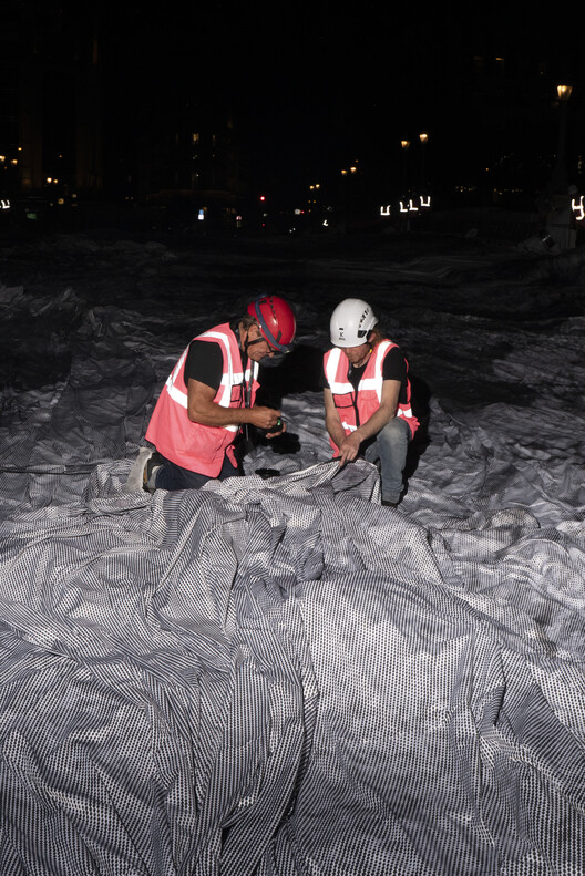 Street Artist JR Installs an Inflatable Cave on Paris' Pont Neuf in Tribute to Christo and Jeanne-Claude Street Artist JR Installs an Inflatable Cave on Paris' Pont Neuf in Tribute to Christo and Jeanne-Claude - Image 16 of 22