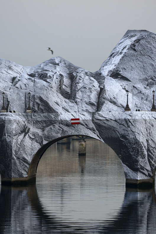Street Artist JR Installs an Inflatable Cave on Paris' Pont Neuf in Tribute to Christo and Jeanne-Claude Street Artist JR Installs an Inflatable Cave on Paris' Pont Neuf in Tribute to Christo and Jeanne-Claude - Image 9 of 22