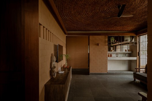 Sudhagar's Mud House / Aagaram Architects - Interior Photography, Wood, Lighting, Chair