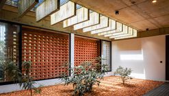 The House Veiled In Brick / LIJO.RENY.architects