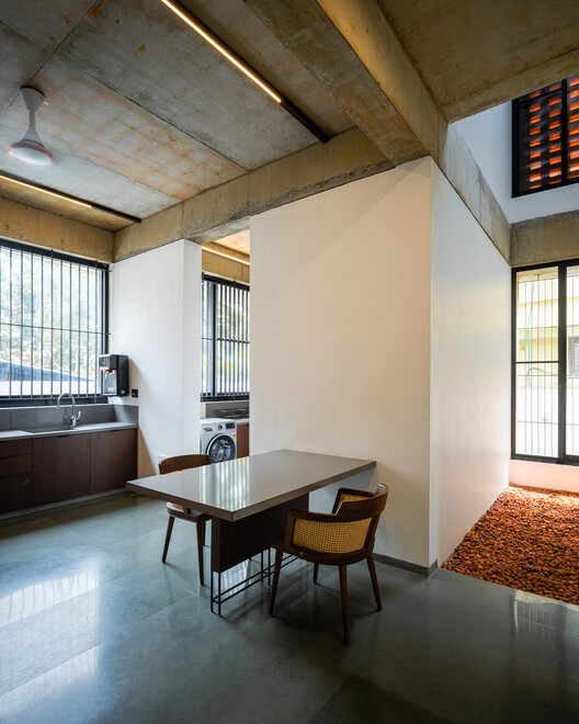 The House Veiled In Brick / LIJO.RENY.architects - Interior Photography, Kitchen, Wood, Lighting, Countertop, Glass, Chair