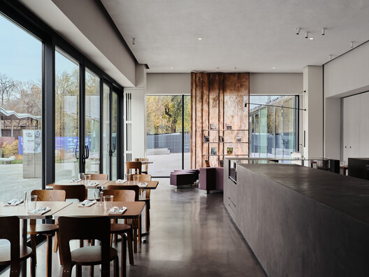 JER café at Tselinny Center of Contemporary Culture / NAAW JER café at Tselinny Center of Contemporary Culture / NAAW - Interior Photography, Wood, Lighting, Table, Countertop, Glass, Chair