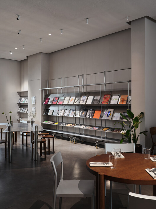 JER café at Tselinny Center of Contemporary Culture / NAAW JER café at Tselinny Center of Contemporary Culture / NAAW - Interior Photography, Dining room, Shelving, Chair