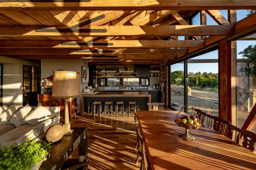 Illapangui del Peumo House / Vergara Arquitectos Illapangui del Peumo House / Vergara Arquitectos - Interior Photography, Wood, Table, Chair, Beam, Deck, Patio