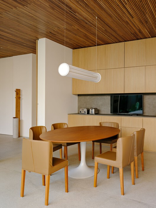 Lego House / Fernanda Marques Arquitetos Associados - Interior Photography, Dining room, Wood, Lighting, Table, Chair