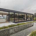 Casa de Acero / Alto Arquitectura - Casas