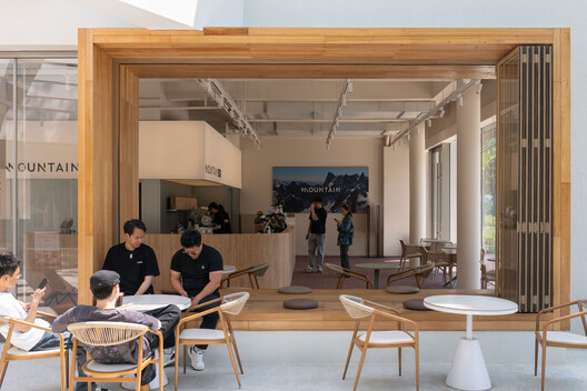 China Resources Wuhan Optics Valley Runjing Park Commercial Renewal / Dachuan Design + WTD Weitu Design - Interior Photography, Dining room, Wood, Table, Chair