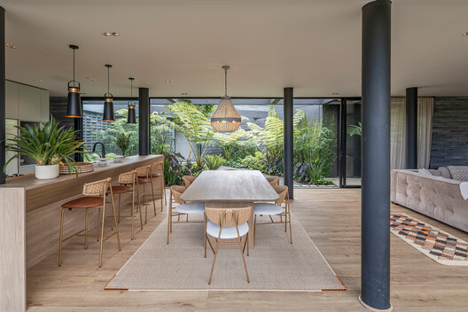 House of Courtyards / Alejandro Restrepo-Montoya Arquitectura + EstudioCentral House of Courtyards / Alejandro Restrepo-Montoya Arquitectura + EstudioCentral - Interior Photography, Dining room, Wood, Table, Chair