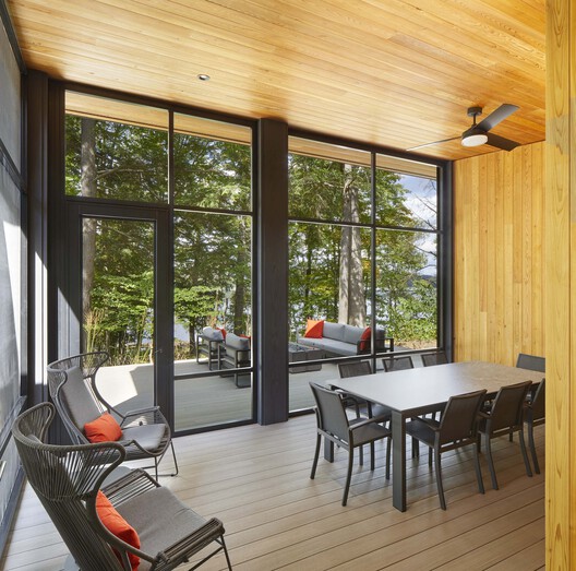 Percy Lake Cottage / Michael Taylor Architecture + Design Percy Lake Cottage / Michael Taylor Architecture + Design - Interior Photography, Dining room, Wood, Table, Chair, Glass, Deck
