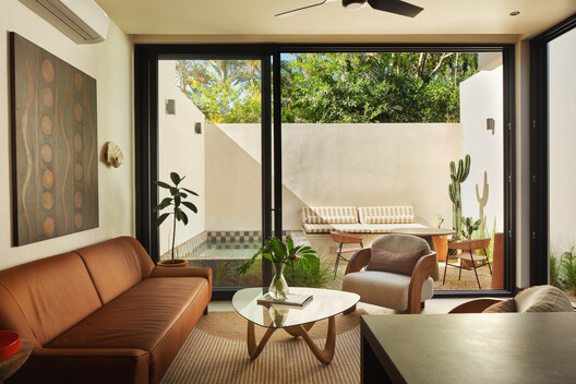 El Molino Residential Development / FAMM Arquitectura El Molino Residential Development / FAMM Arquitectura - Interior Photography, Living Room, Wood, Table, Lighting, Chair