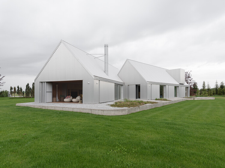 Lake house / Ultra Architects - Houses
