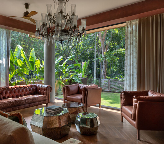 A Tale of Tinted Courts Residence / Architects Collaborative A Tale of Tinted Courts Residence / Architects Collaborative - Interior Photography, Living Room, Wood, Sofa, Chair