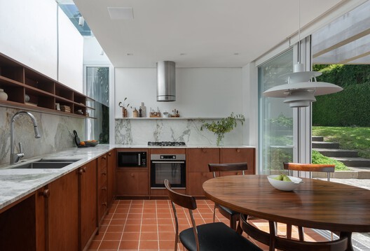 Ouriques House / Ultra Arquitetura Ouriques House / Ultra Arquitetura - Interior Photography, Kitchen, Countertop, Wood, Lighting, Chair