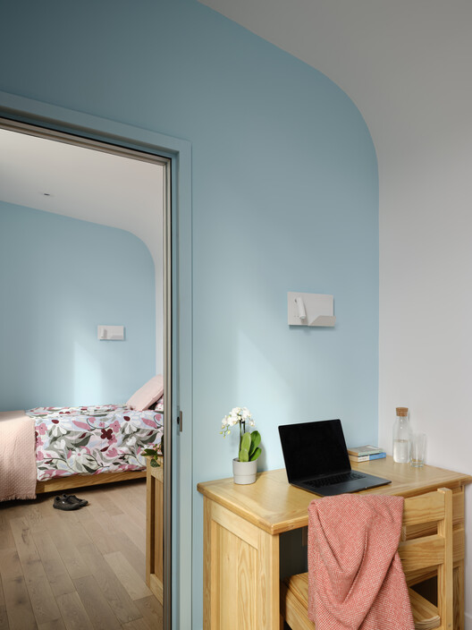 Anduhyaun Emergency Shelter / LGA Architectural Partners Anduhyaun Emergency Shelter / LGA Architectural Partners - Interior Photography, Bedroom, Lighting