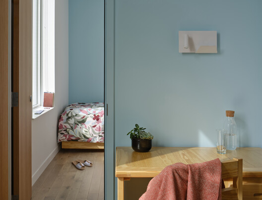 Anduhyaun Emergency Shelter / LGA Architectural Partners Anduhyaun Emergency Shelter / LGA Architectural Partners - Interior Photography, Bedroom, Wood, Door