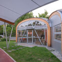 TBB Libraries – Hundred Flowers Park Libraries / Atelier Liu Yuyang Architects - Exterior Photography, Library, Arch