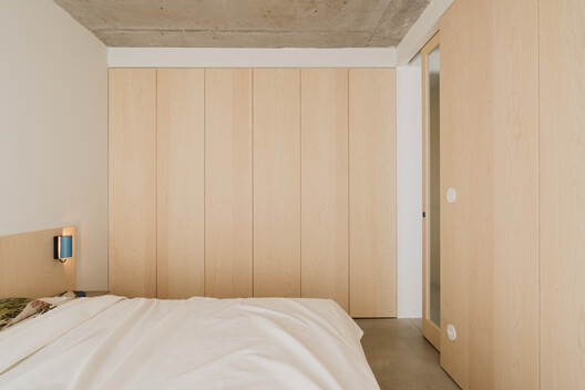 Apartment in the Heart of Jeżyce in Poznań / LBWA Apartment in the Heart of Jeżyce in Poznań / LBWA - Interior Photography, Bedroom, Wood