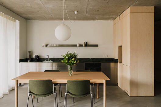 Apartment in the Heart of Jeżyce in Poznań / LBWA Apartment in the Heart of Jeżyce in Poznań / LBWA - Interior Photography, Wood, Table, Chair, Lighting, Countertop