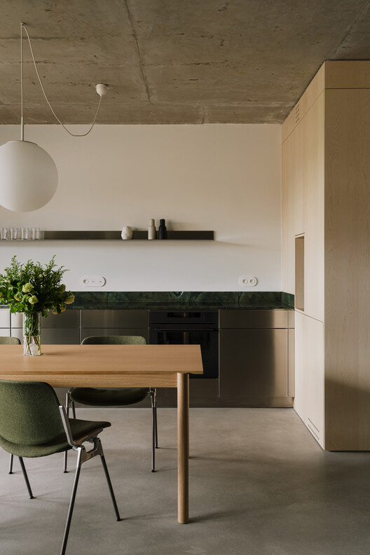 Apartment in the Heart of Jeżyce in Poznań / LBWA Apartment in the Heart of Jeżyce in Poznań / LBWA - Interior Photography, Table, Chair, Countertop