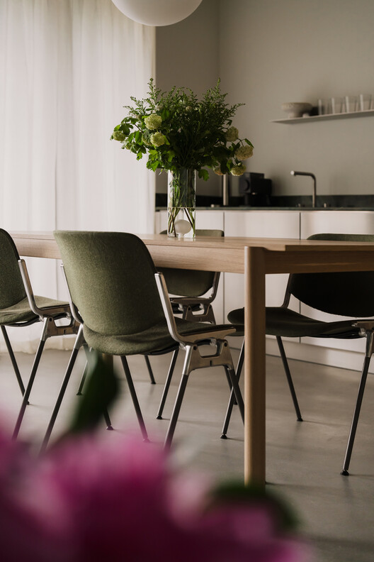 Apartment in the Heart of Jeżyce in Poznań / LBWA Apartment in the Heart of Jeżyce in Poznań / LBWA - Interior Photography, Dining room, Wood, Table, Chair