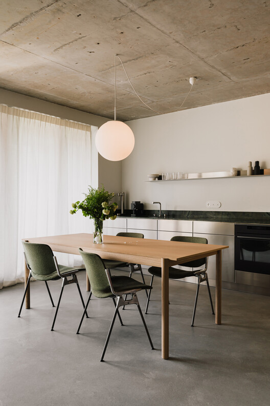 Apartment in the Heart of Jeżyce in Poznań / LBWA Apartment in the Heart of Jeżyce in Poznań / LBWA - Interior Photography, Dining room, Wood, Table, Chair