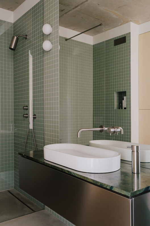 Apartment in the Heart of Jeżyce in Poznań / LBWA Apartment in the Heart of Jeżyce in Poznań / LBWA - Interior Photography, Bathroom, Sink, Glass, Countertop, Bathtub