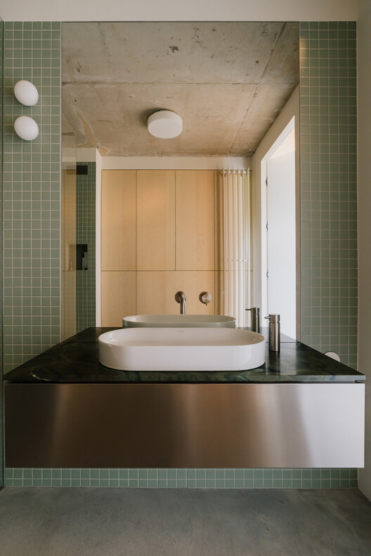 Apartment in the Heart of Jeżyce in Poznań / LBWA Apartment in the Heart of Jeżyce in Poznań / LBWA - Interior Photography, Bathroom, Sink, Glass, Countertop, Bathtub