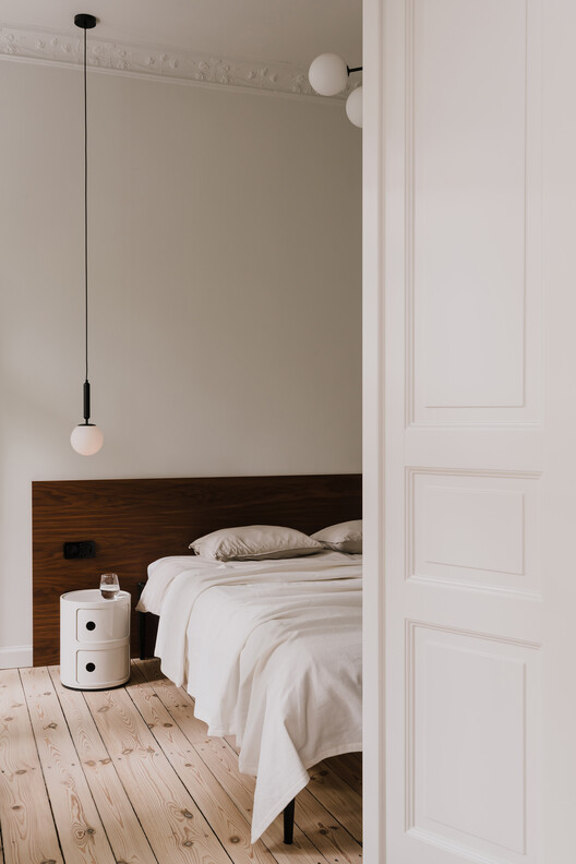 Apartment Interior within Poznań's Łazarz District / LBWA Apartment Interior within Poznań's Łazarz District / LBWA - Interior Photography, Bedroom, Wood, Lighting