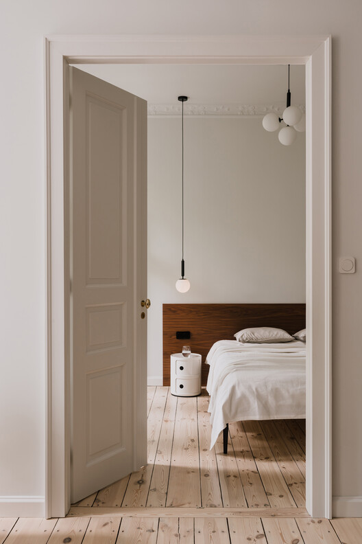 Apartment Interior within Poznań's Łazarz District / LBWA Apartment Interior within Poznań's Łazarz District / LBWA - Interior Photography, Bedroom, Wood, Door