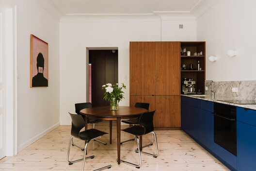 Apartment Interior within Poznań's Łazarz District / LBWA Apartment Interior within Poznań's Łazarz District / LBWA - Interior Photography, Kitchen, Wood, Lighting, Countertop, Chair