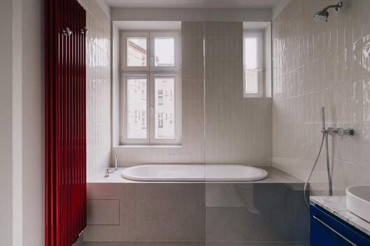 Apartment Interior within Poznań's Łazarz District / LBWA Apartment Interior within Poznań's Łazarz District / LBWA - Interior Photography, Bathroom, Bathtub, Glass, Sink
