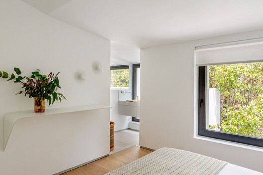 Full Renovation LVL / Ábaton Full Renovation LVL / Ábaton - Interior Photography, Bedroom, Wood, Lighting, Bed